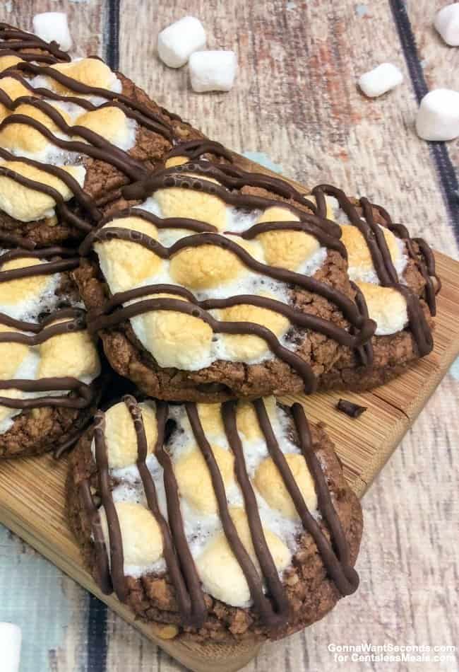 Mississippi Mud Cookies on a wooden board with marshmallows on the side