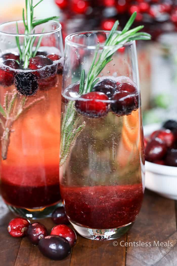 Glass of cranberry Mimosa with cranberries