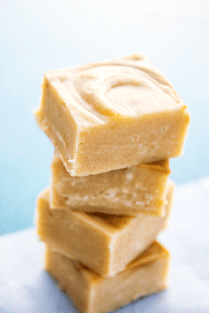 White chocolate peanut butter swirl fudge in a stack