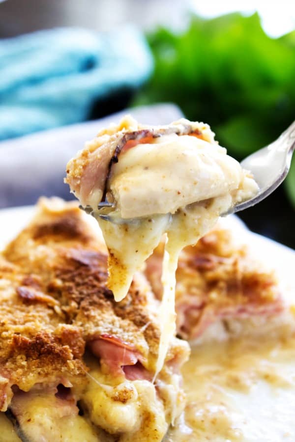 Creamy Chicken Cordon Bleu Casserole on a fork