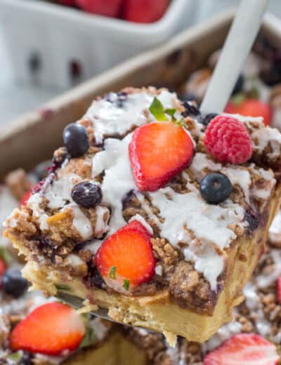 piece of french toast bake with berries and icing