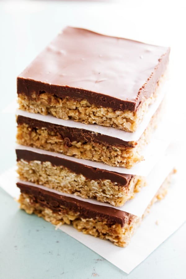 Chocolate peanut butter oatmeal bars on parchment paper