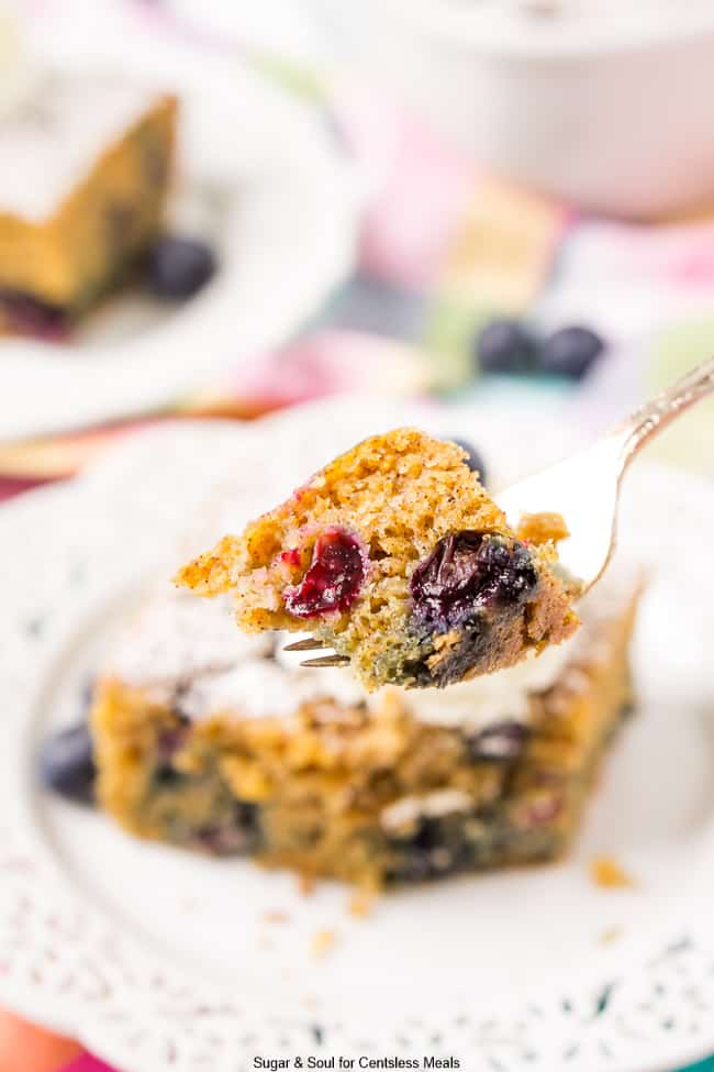 Overnight blueberry coffee cake on a fork