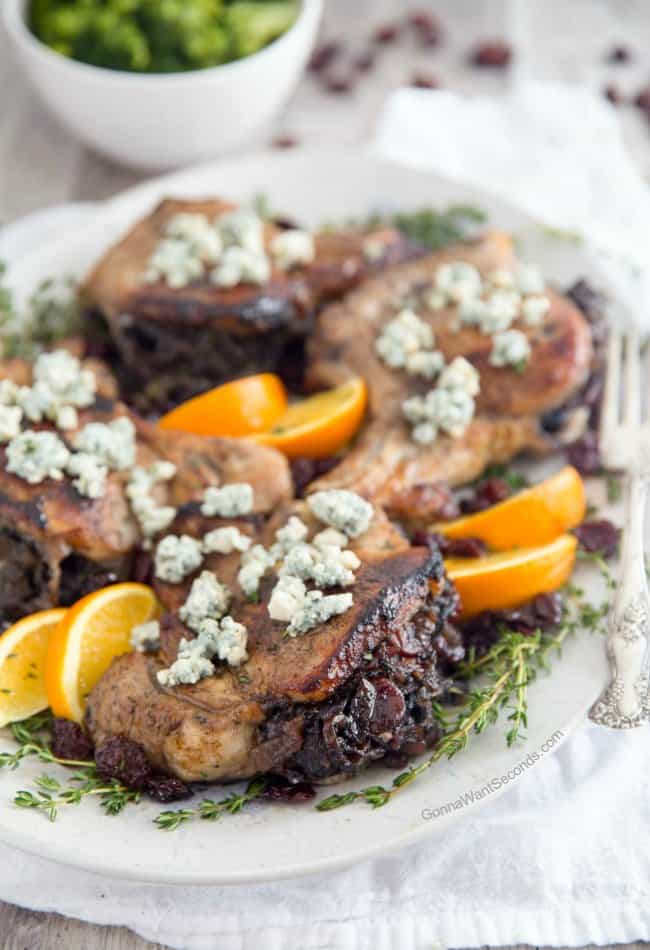 Stuffed Pork Chops on a white platter