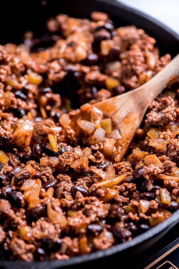 Beef mixture in a frying pan for beef enchiladas