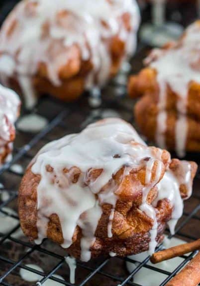Quick and easy apple fritters are sweet and cinnamony. Soft and tender like a pillow, loaded with apple chucks and topped with a sugar glaze.
