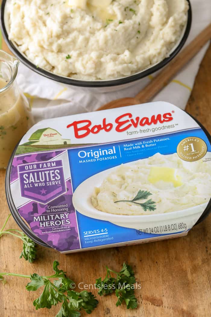 Bob Evans mashed potatoes with a bowl of mashed potatoes and gravy