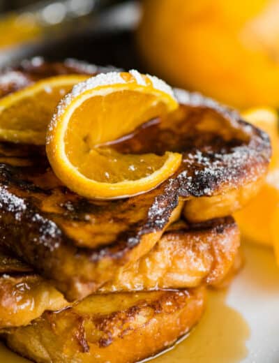 stack of french toast with orange