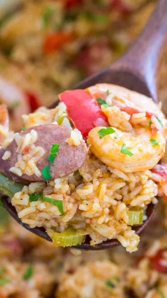 scoop of Jambalaya Recipe with a wooden spoon