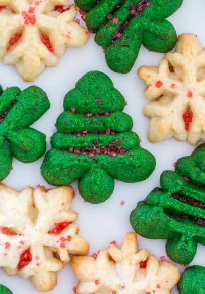 Spritz Cookies are fun to make, look festive, and taste delicious. They are perfect for the holiday season, and can be made in various colors and shapes.