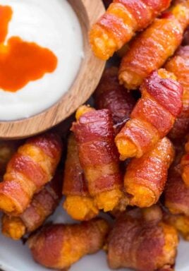 Bacon Wrapped Tater Tots make the perfect finger food. Such an easy, perfect bite size appetizer, that can be put together with minimum effort and fairly quickly.