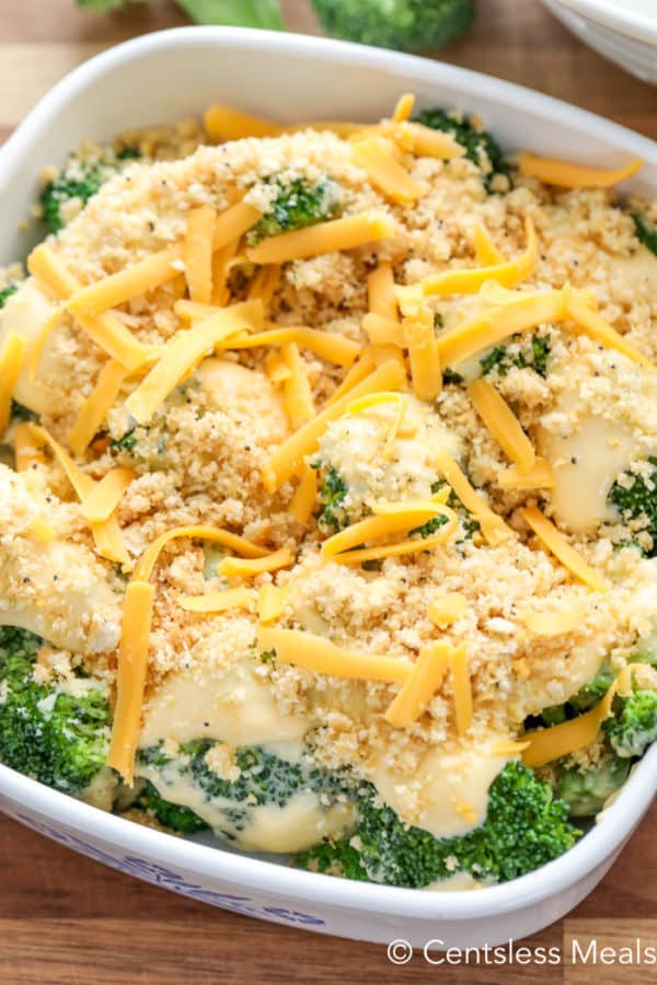 Broccoli Casserole with cracker crumbs and cheese on top ready for the oven