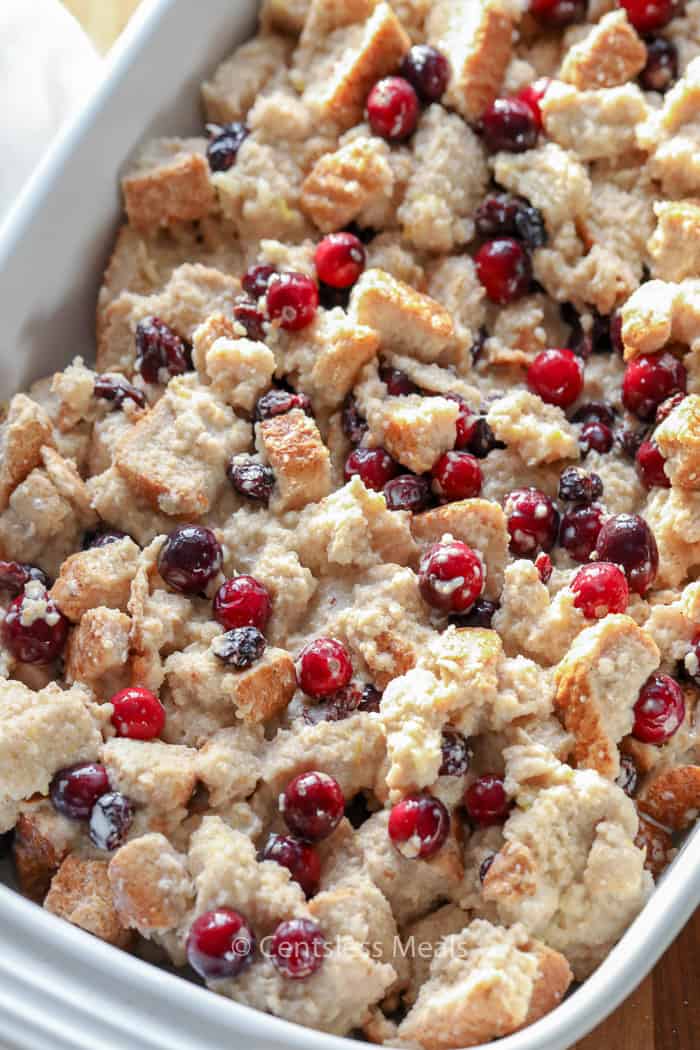 Cranberry bread pudding in a white dish