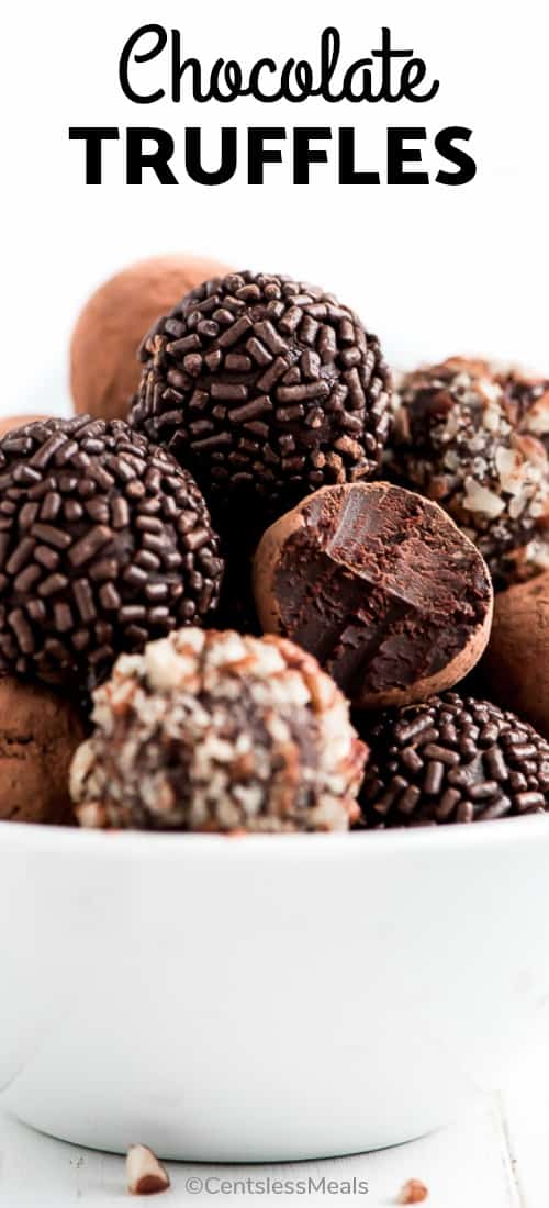 Chocolate truffles in a white bowl with writing