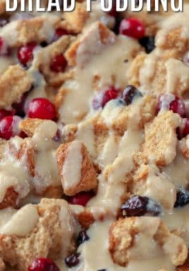 Cranberry bread pudding in a casserole dish with a title