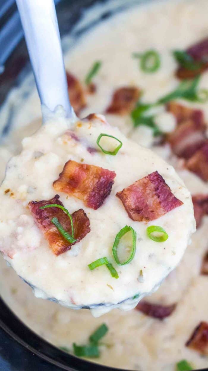 Slow Cooker Baked Potato Soup with a ladle