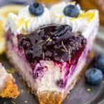 Blueberry Cheesecake Slice on a plate with a bite taken out