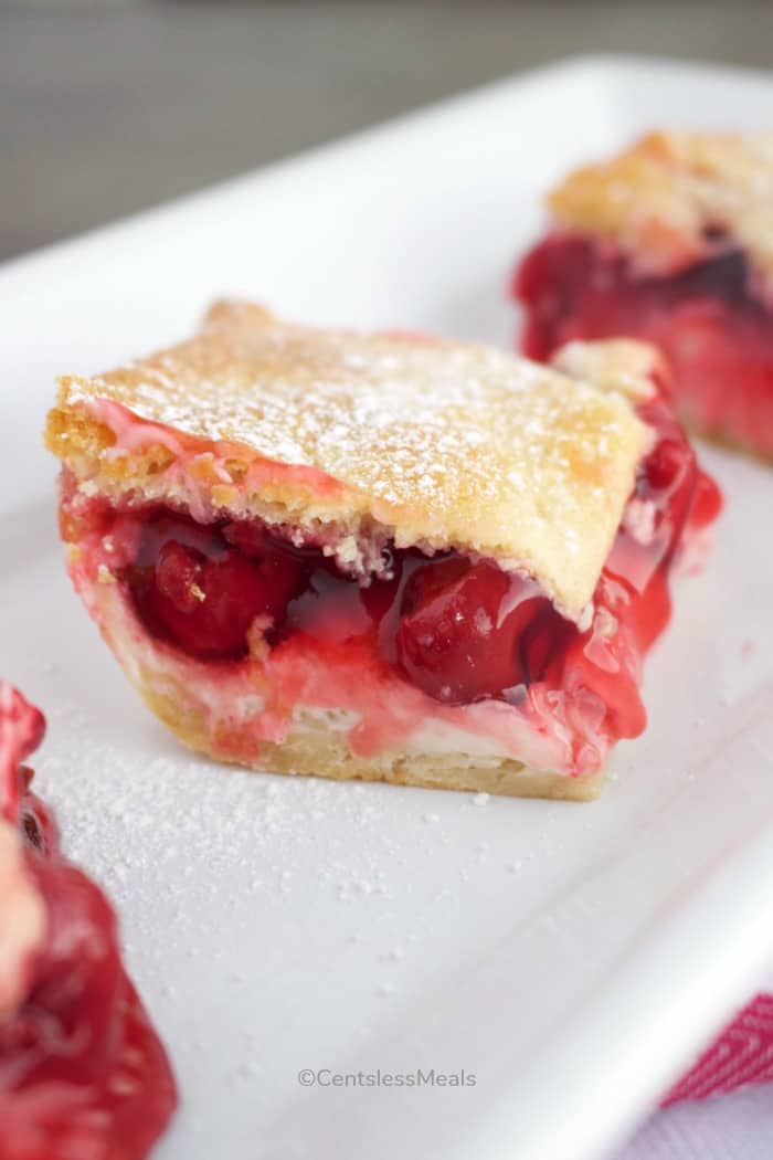 Cheesecake bake pieces on a white serving plate