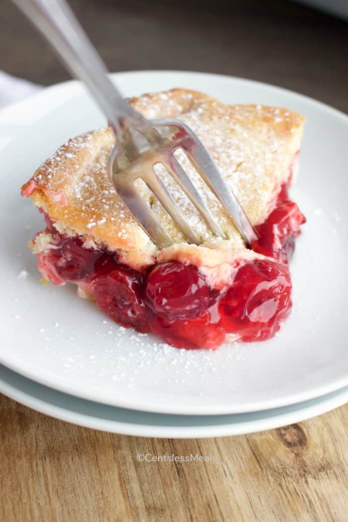 Cheesecake baked on a plate with a fork