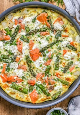 Simply Potatoes salmon frittata in a pan with parsley