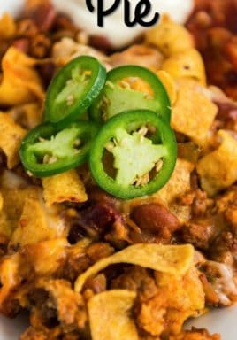 Frito pie on a plate with a title