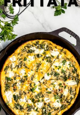 Spinach frittata in a cast iron pan with a title