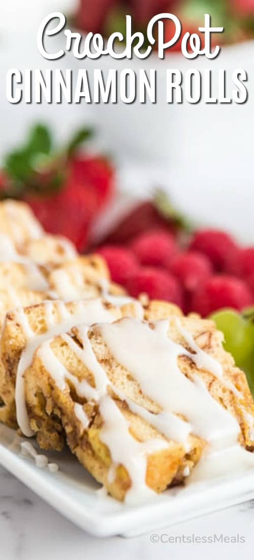 Crock-Pot cinnamon rolls on a plate with a title