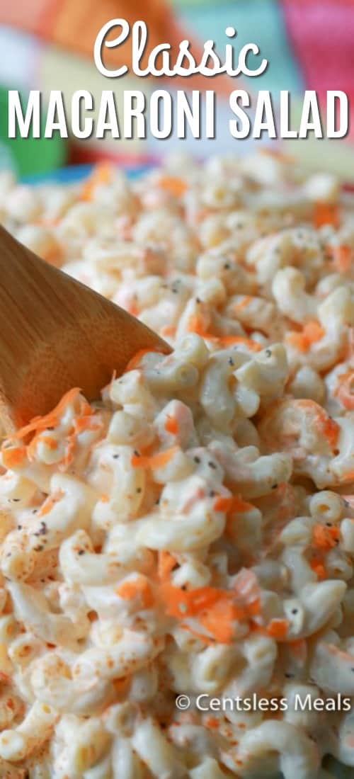 Classic macaroni salad with a wooden spoon and a title