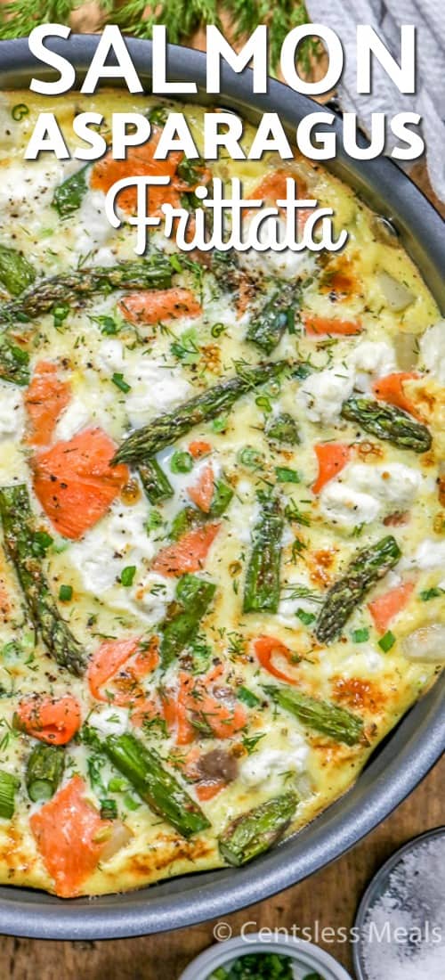 Salmon asparagus frittata in a pan with writing