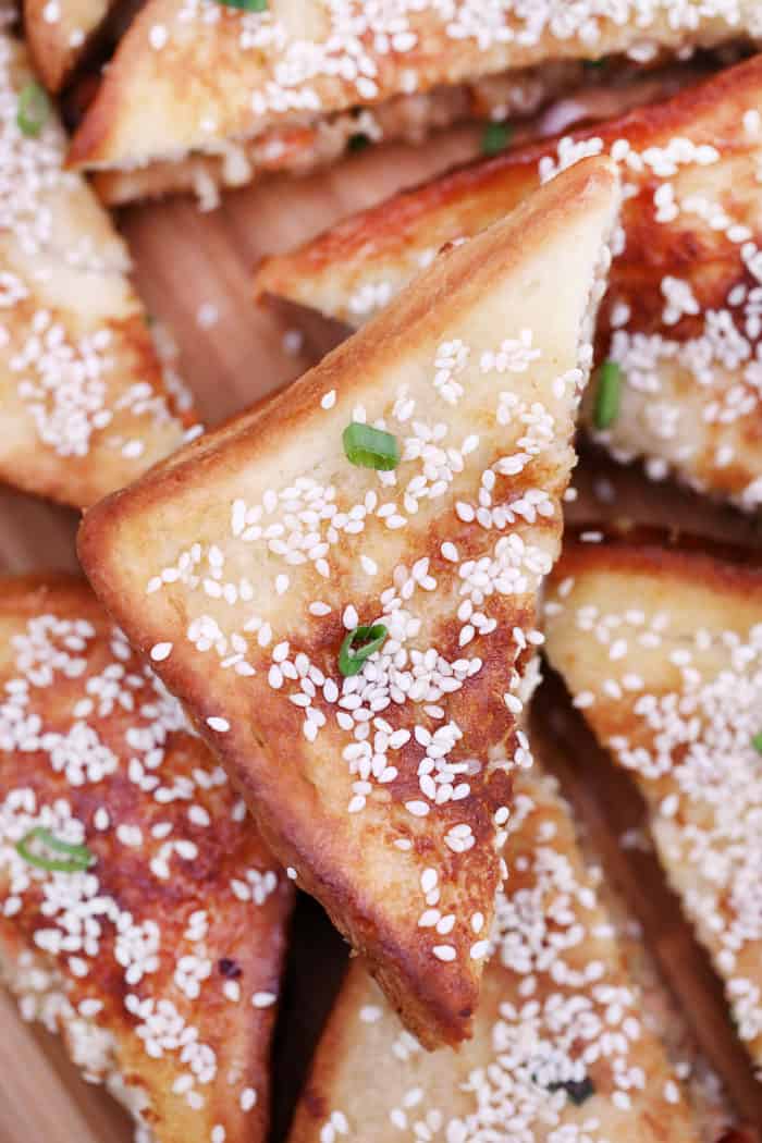 Chinese Shrimp Toast garnished with green onions and sesame seeds