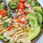 Chicken burrito bowl with a metal Fork