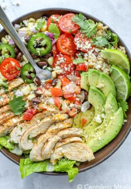 Chicken burrito bowl with a metal Fork