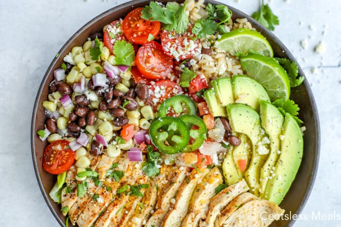 Chicken burrito bowl on a marble board