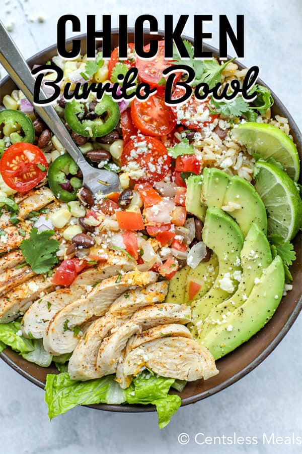 Chicken burrito bowl with a fork and a title