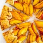 Peach Galette slices on parchment paper