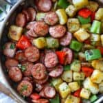 Sausage and potato Skillet in a pot with a spoon