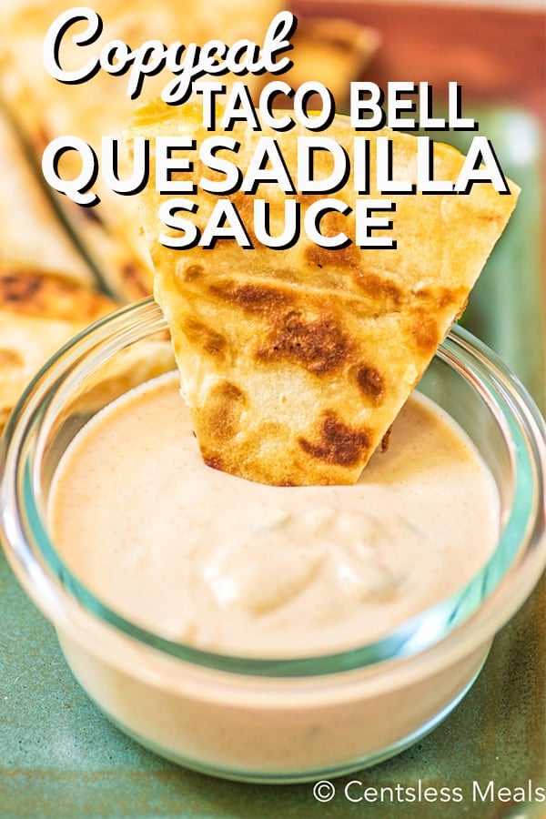 Taco Bell quesadilla sauce in a clear jar with writing