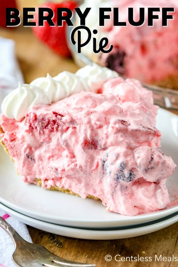 Piece of berry fluff pie on a plate with writing