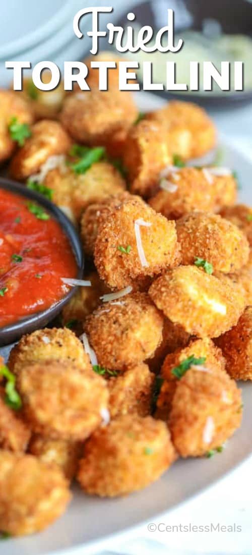 Fried tortellini on a plate with a title