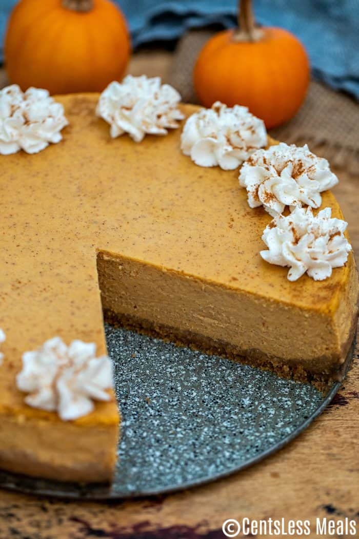 Pumpkin cheesecake with a piece taken out