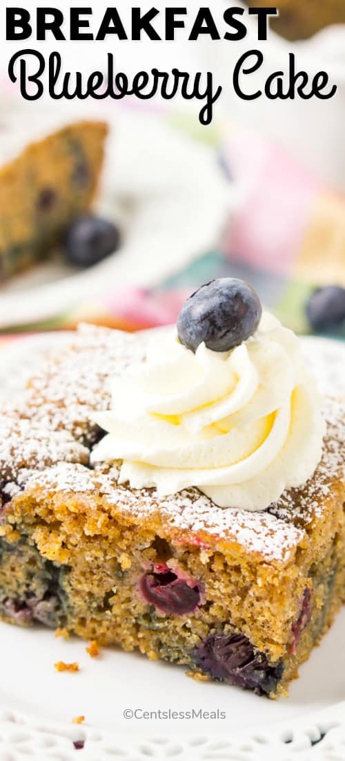 Breakfast blueberry cake on a plate with a title