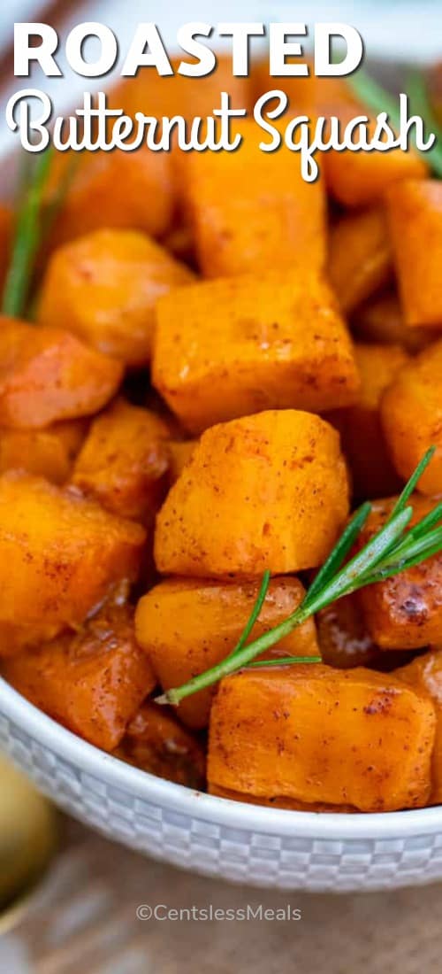 Roasted butternut squash in a bowl with rosemary and a title