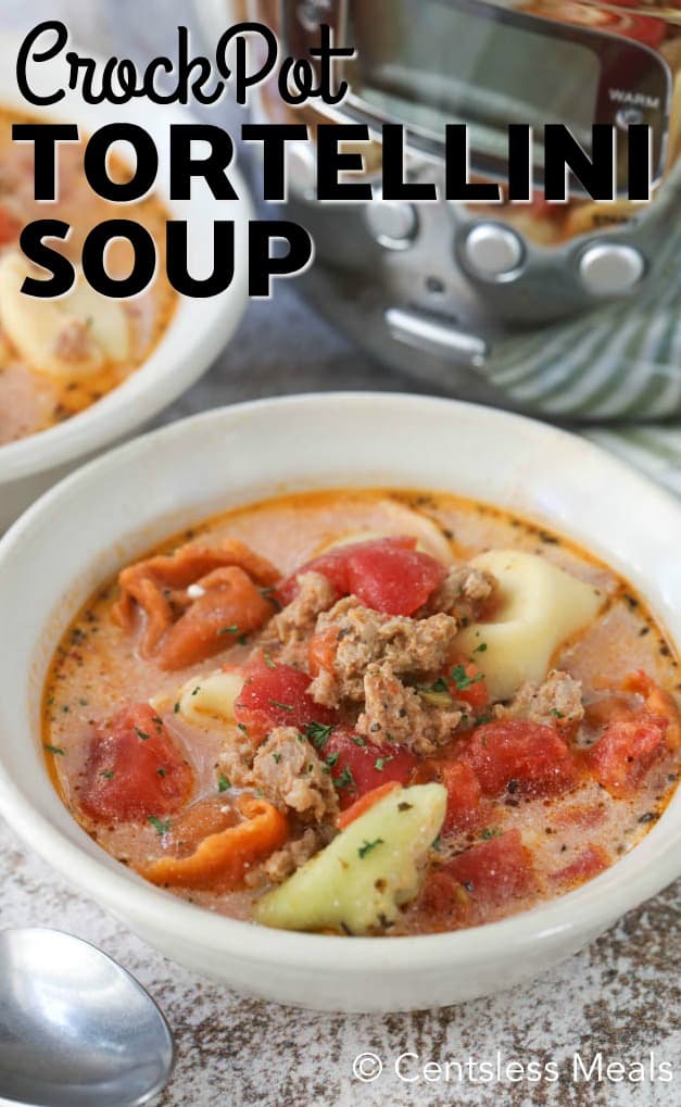 Crock-Pot tortellini soup in a white bowl with a title