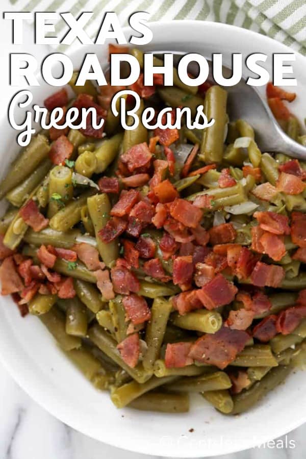 Texas Roadhouse green beans in a white bowl with a spoon and writing