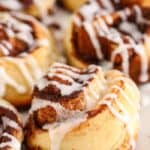 Cinnamon rolls with icing on a plate