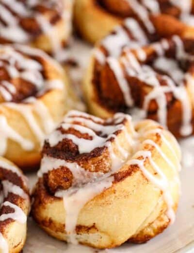 Cinnamon rolls with icing on a plate