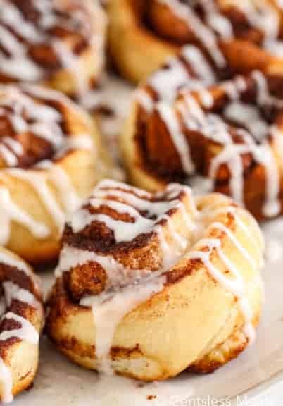 Cinnamon rolls with icing on a plate
