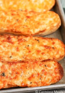 Cheesy bread on a baking sheet