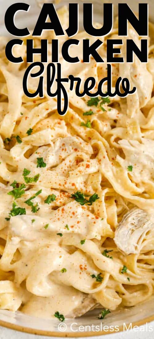 Cajun chicken alfredo in a bowl with writing