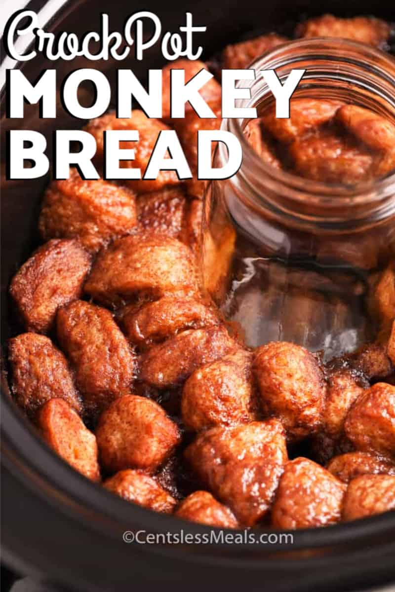 Monkey Bread in a crock pot with a mason jar and writing